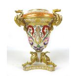 A large early 19th century Derby Campana urn, applied with gilded mythical dragons to the rim and