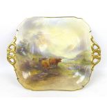 A Royal Worcester twin handled dish by John Stinton, circa 1920s, painted with highland cattle in
