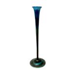 A Tiffany Favrile iridescent blue glass vase, numbered '9666 K' and signed L. C. Tiffany Favrile' to