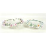 Two porcelain baskets, by Celtic Weave, decorated with applied floral sprays on a woven body, one an