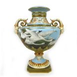 A Royal Worcester vase by Raymond Rea, painted with four swans in flight to a powder blue ground,
