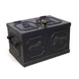 An early 20th century cast iron safe, with key, 52 by 36 by 33cm high.
