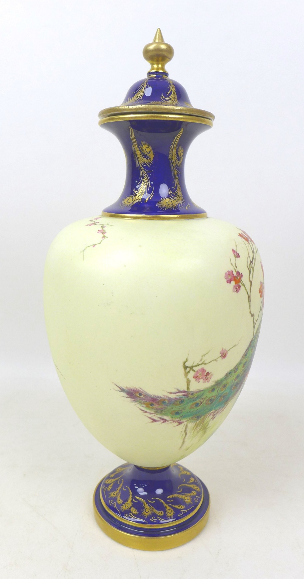 A Royal Worcester vase and cover, painted with a peacock perched on a branch in a blossom tree, on - Image 2 of 9