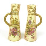 A pair of Royal Worcester jugs, circa 1906, shape 1047, the peach ground painted with summer