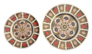 Two Royal Crown Derby plates, in the Imari pattern, 1128, both richly gilded, 27 and 21.5cm