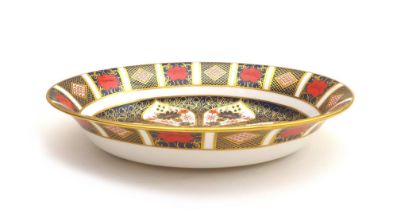 A Royal Crown Derby oval bowl, in the Imari pattern, 1128, richly gilded to the interior and