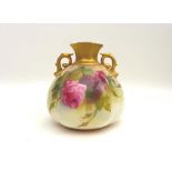 A Royal Worcester twin handled vase, with quarter lobed body, decorated all round with roses, signed