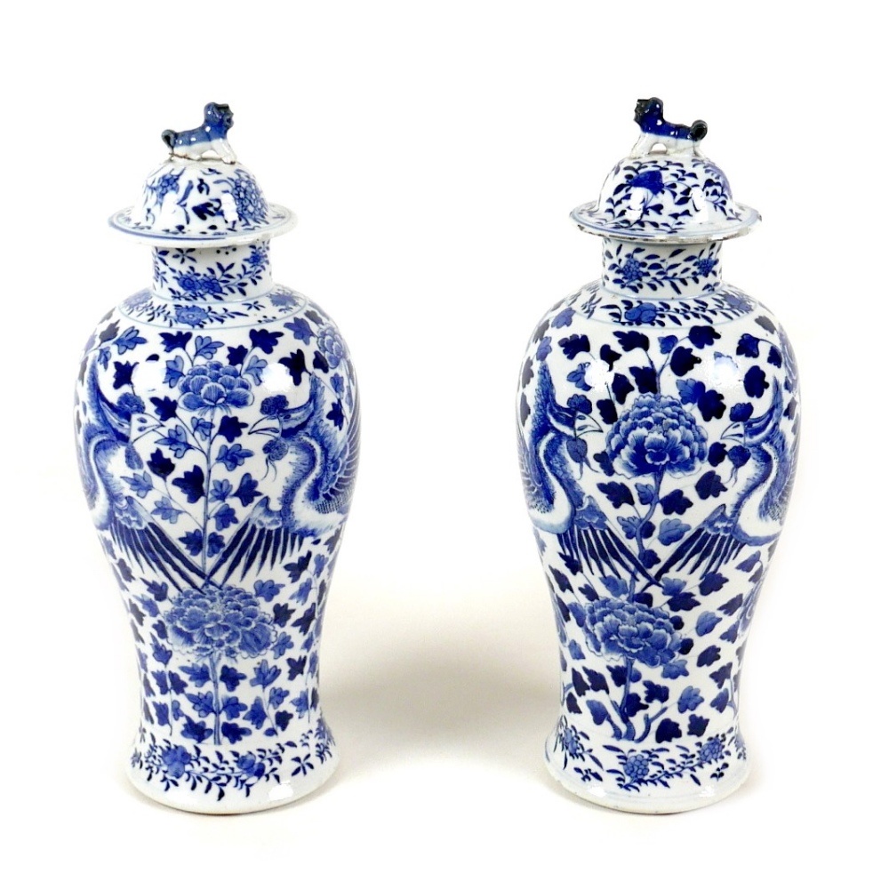 A pair of Chinese porcelain vases, Qing Dynasty, 19th century, each of baluster form, the associated