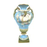 A Royal Worcester Charles Baldwyn twin handled pedestal vase, circa 1920s, decorated with swimming