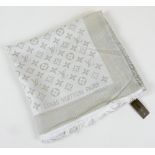 A Louis Vuitton pashmina shawl, silver/grey with logo pattern, purportedly purchased at Louis