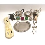 A group of mixed collectables, including a silver plated tankard, 11.5cm, three teapots, six