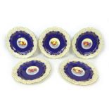 A set of five Royal Worcester cabinet plates by E. Townsend, the central panels painted with fruit