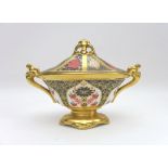 A Royal Crown Derby urn and cover, of boat shape, decorated in the Old Imari palette pattern No.
