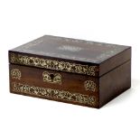 A Victorian rosewood and brass inlaid dressing table case, containing five white metal bottles and