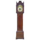 An 18th century mahogany long case clock, signed Charles Shuckburgh London, with two train movement,