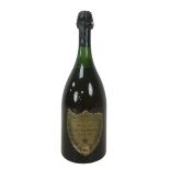 Vintage champagne, a bottle of Moet & Chandon Cuvee Dom Perignon, vintage 1964, U: mid-shoulder,
