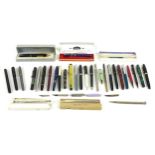 A collection of fountain pens and propelling pencils, mostly damaged, including four fountain pens