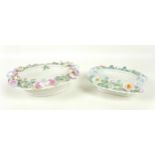 Two porcelain baskets, by Celtic Weave, decorated with applied floral sprays on a woven body, one an