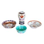 A group of Chinese porcelain items, comprising a porcelain baluster vase, circa 1900, decorated with