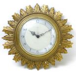 A vintage Smiths Sectric sunburst form wall clock.