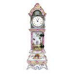 A 19th century continental porcelain long case clock, with verge fusee pocket watch movement,