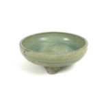 A Chinese 'Longquan' celadon tripod censer, possibly Ming, crackled green glaze running to an uneven