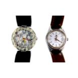 A Tissot 'RockWatch' lady's wristwatch, R150, with speckled green granite circular dial, red and