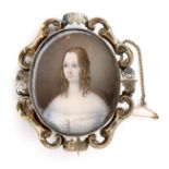 A Victorian gold framed portrait miniature brooch, depicting a lady in white lace, silk backed, 5.