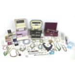 A large collection of costume jewellery, including a silver bracelet with heart padlock charm, dress