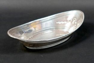 A silver dish, of boat form with pierced decoration, 23.5 by 12 by 5.5cm high, 6.5toz.