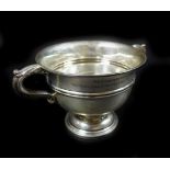 A George VI silver twin handled cup bearing inscription 'District Commander's Proficiency Cup 1943-