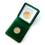 An Elizabeth II gold proof sovereign, 1980, in protective plastic casing and green Royal Mint