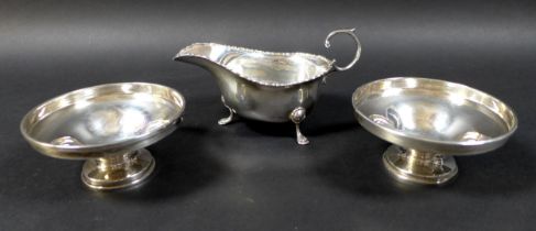 Three pieces of George V and later silver, comprising a George V silver sauce boat, Robert Pringle &