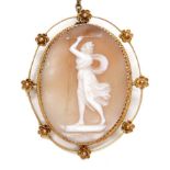 A Victorian 9ct gold oval shaped cameo brooch, carved with a classical lady brandishing an arrow