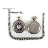 Two Victorian silver keyless wind pocket watches, both with brass crowns, comprising a half