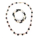 A white and black pearl necklace, with 14ct gold clasp, approximate sizes of necklace pearls: