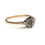 A 9ct gold and diamond cluster ring, set with sixteen brilliant cut diamonds, each 1.4mm, in a