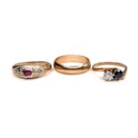 Three 9ct gold rings, comprising a diamond and sapphire crossover ring, round cut sapphire, 4.5mm