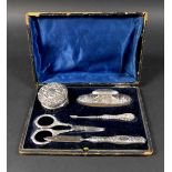 Five silver manicure items in an associated box, four by S Blanckensee & Son Ltd marked Chester