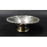A silver dish with scalloped edge, Mappin and Web Ltd., Sheffield 1952, total weight 2.12 toz, 10.