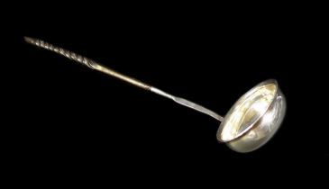 A George III toddy ladle with ebony twist handle, with a 1787 George III shilling to dish, overall