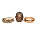 Three 9ct gold rings, a diamond gold ring with three rows of chip stones, size O/P, a gold band,