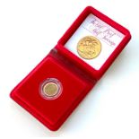 An Elizabeth II gold proof half sovereign, 1980, in protective plastic casing and red Royal Mint