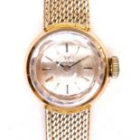 An Omega 18K gold cased lady's wristwatch, circa 1970s, model 542.645, the circular gold dial with