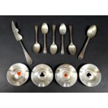 A small group of silver items, comprising four dishes with whist suits, 7.2cm