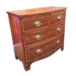 A Victorian mahogany chest of two over two drawers, with satinwood inlaid borders to drawer