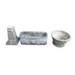 Three pieces of garden stoneware, comprising a stoneware trough planter, 70 by 26.5 by 26cm high,