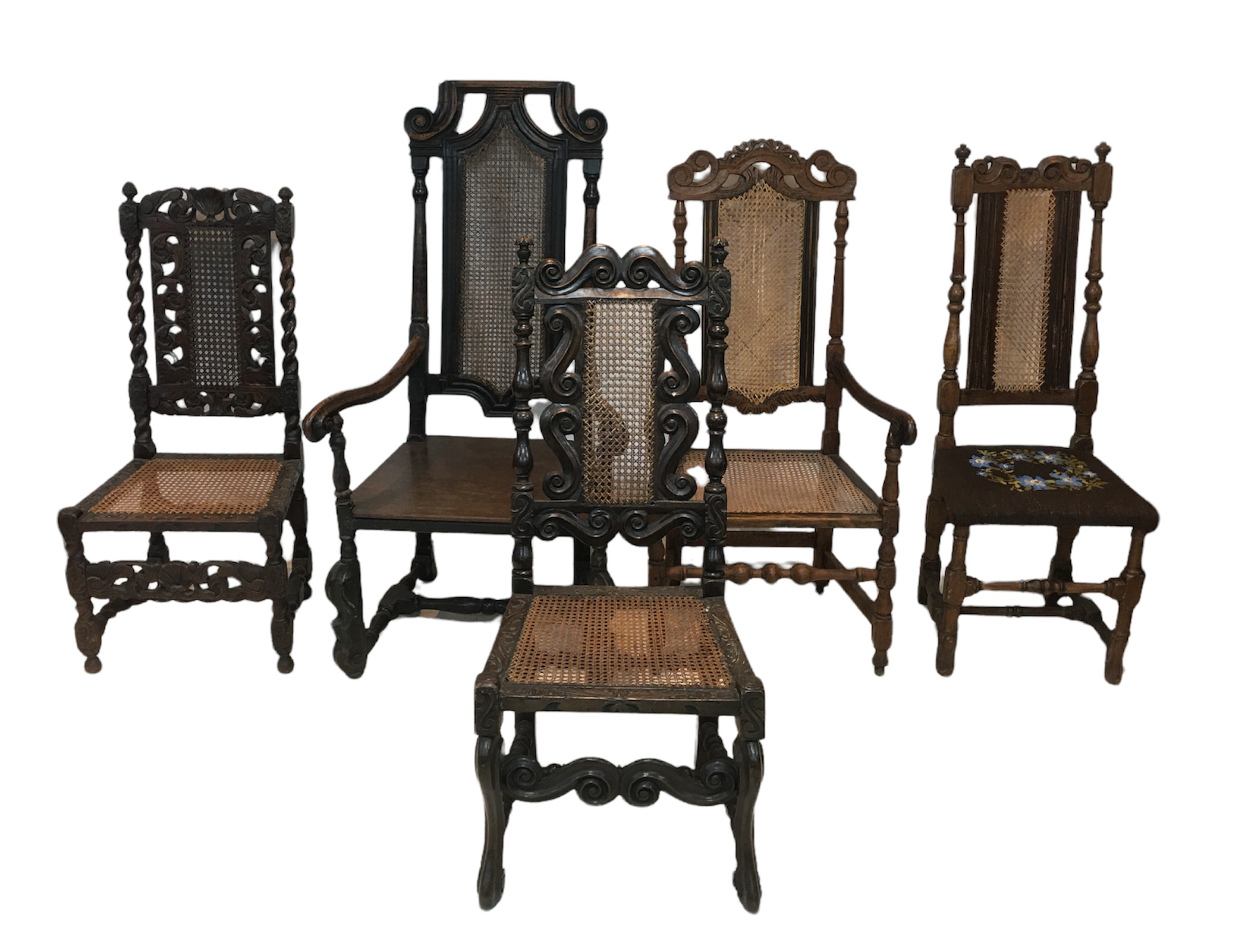 A collection of five dining and side chairs, including an 18th century oak open arm chair with