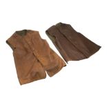 Two WWII leather jerkins and assorted WWII related shrapnel, including part of a incendiary bomb