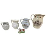 Four 19th century creamware and later water jugs, including a Coalport Feltspar Norfolk jug, 17cm